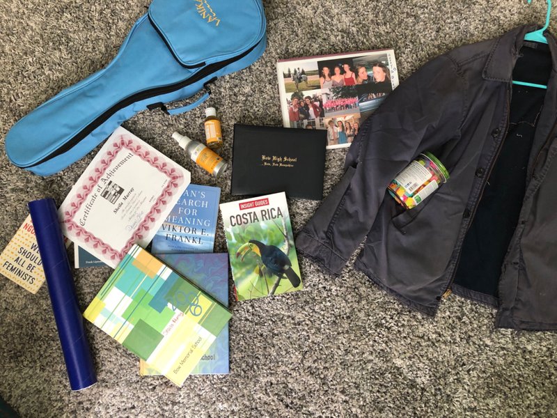 A small pile of things I was sifting through including my ukulele, photo album from my 16th birthday, the “grateful jar” I kept for a year, and my Dad’s Coast Guard jacket.  (No worries, Dad, I didn’t give it away!)