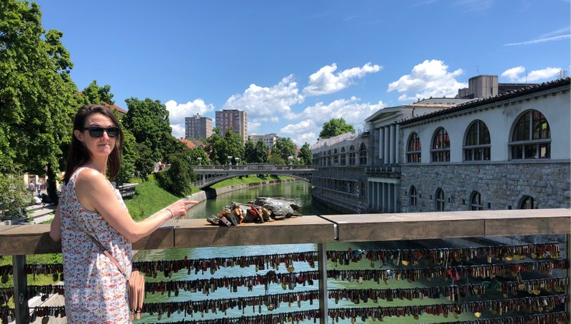 In the scenic heart of Ljubljana, locals adorn the bridge and frog statues with “love locks”