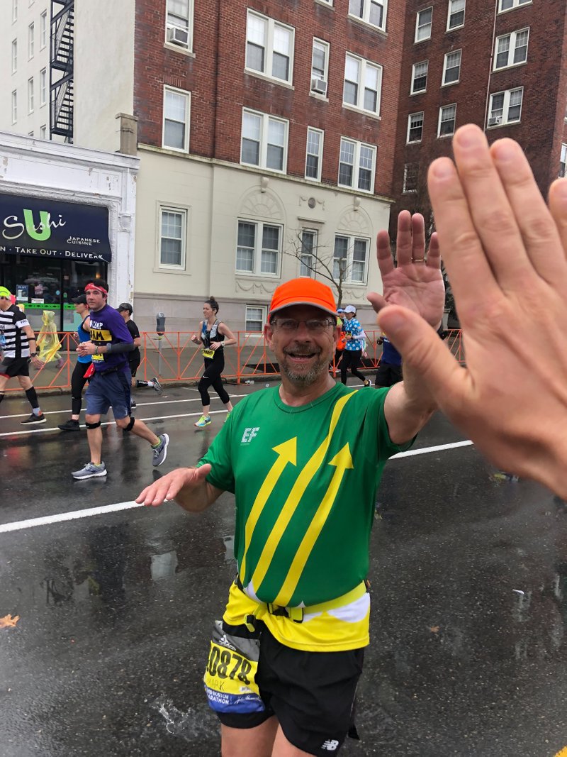 Running the marathon in what can only be described as “Boston weather.”