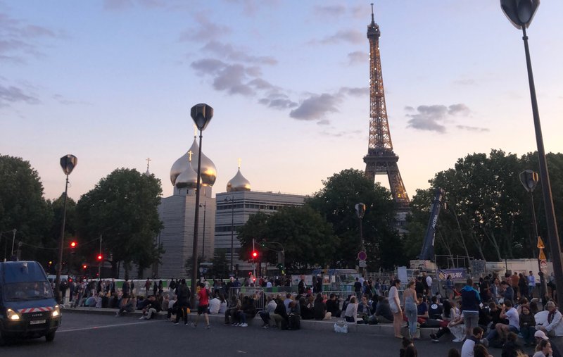 The Bastille Day fireworks show is no small thing — people must post up for hours before the show begins, simply setting up a picnic and enjoying the evening,